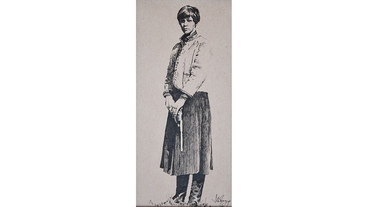 young Western woman holding a pistol