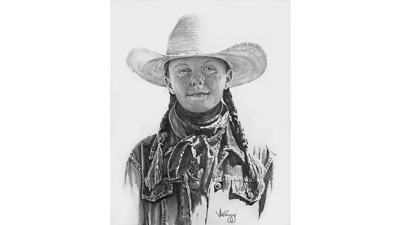 portrait of young cowgirl