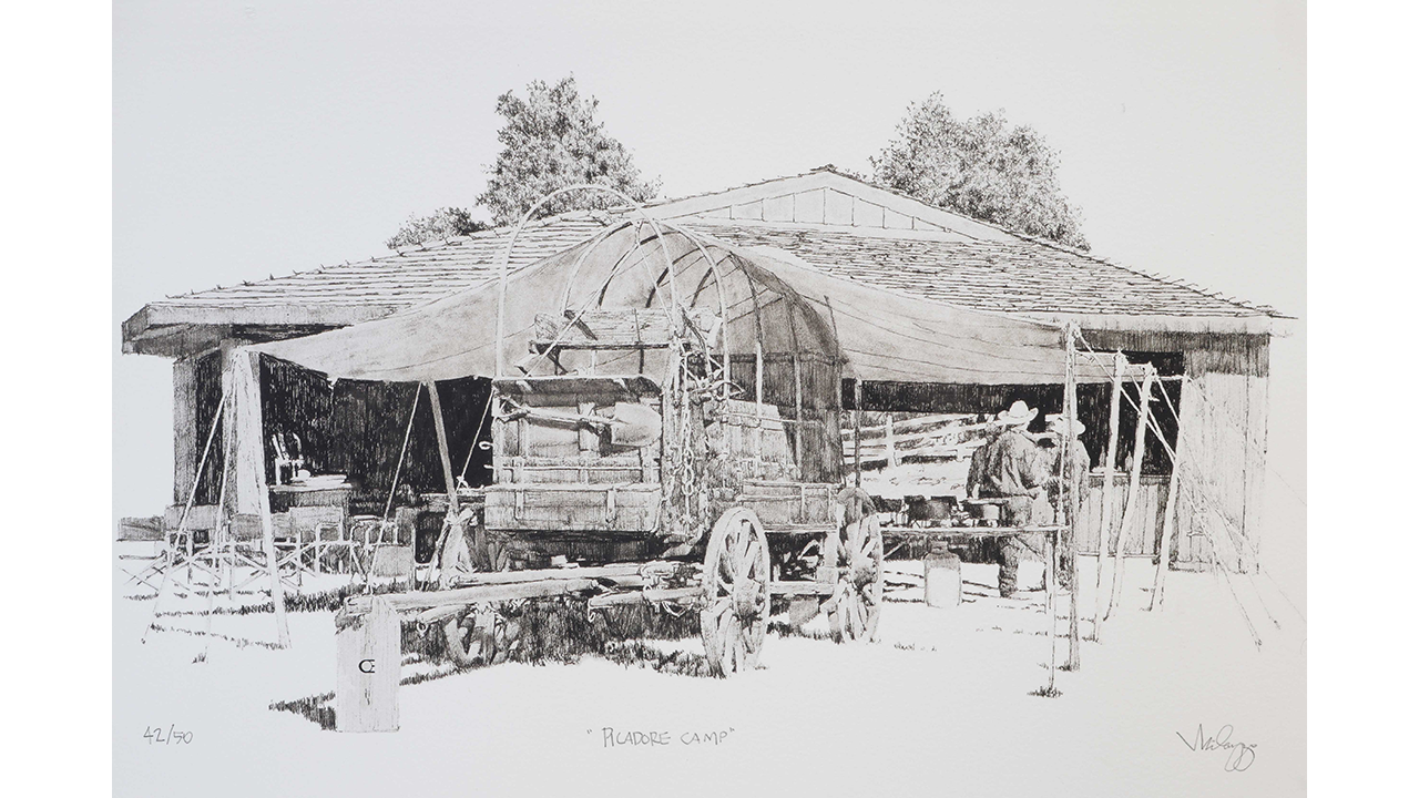 ranchero camp with chuckwagon in foreground