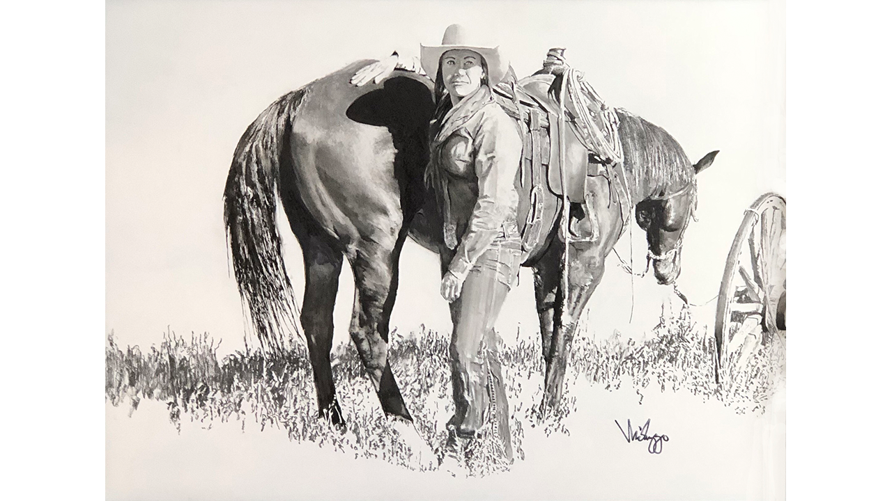 Cowgirl standing by her horse in grasses, wagon wheel