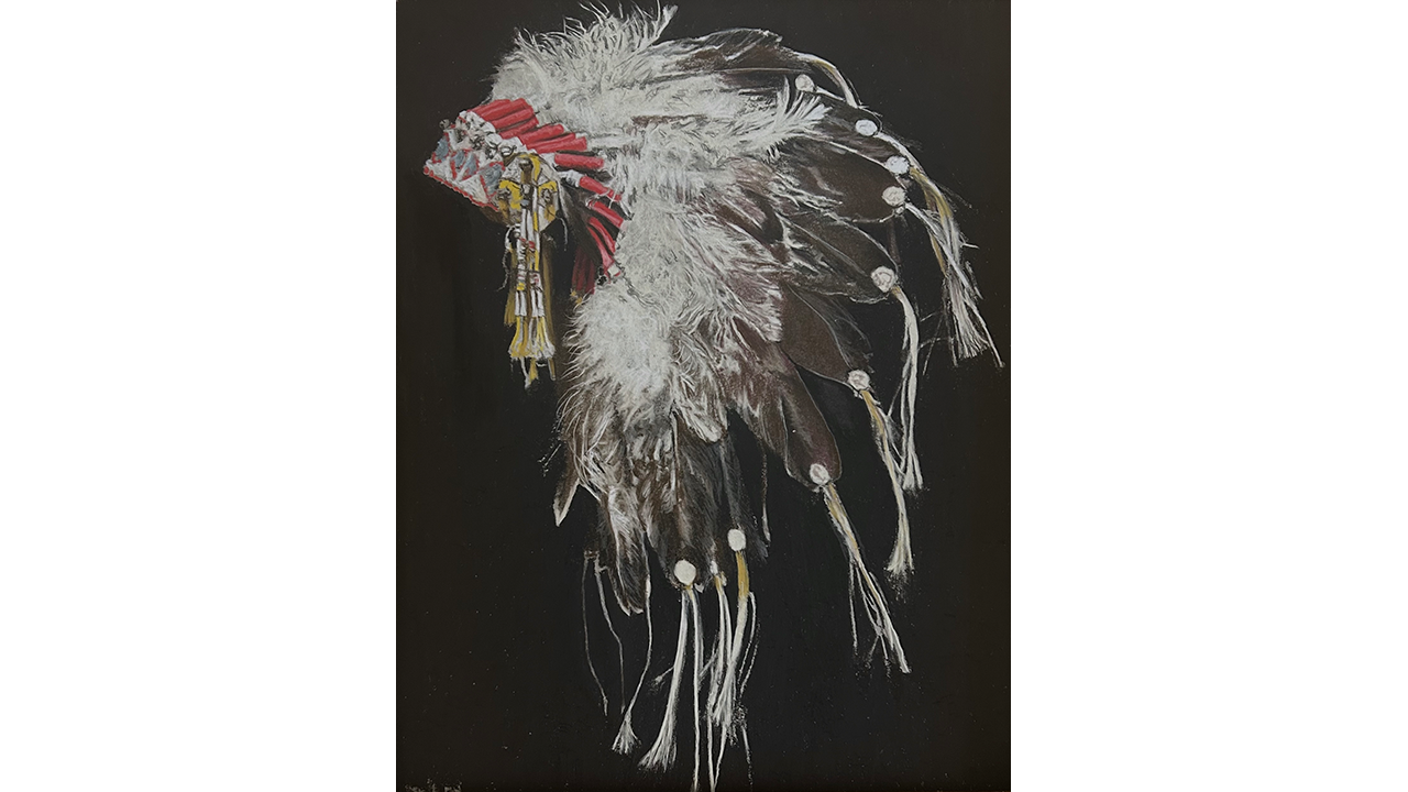 Plains native feathered war bonnet on black background